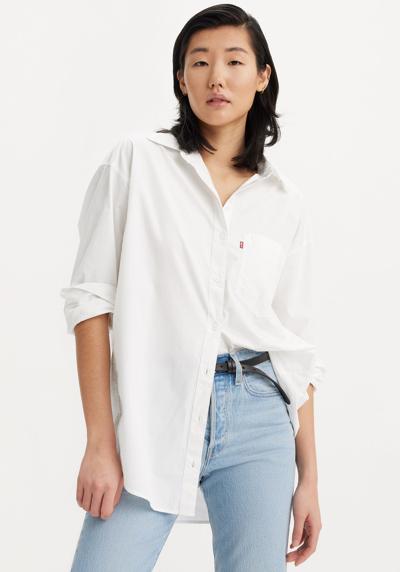 Блузка-рубашка в модном стиле оверсайз.