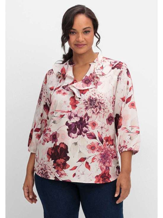 Туника с воланом по вырезу и цветочным принтом. Große Größen