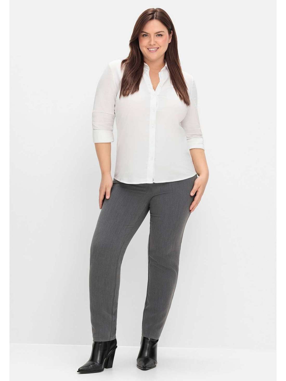 Брюки стрейч с пестрым узором на поясе, который можно притянуть. Große Größen