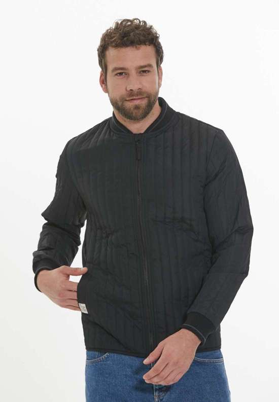 Стеганая куртка с практичными боковыми карманами. Palle