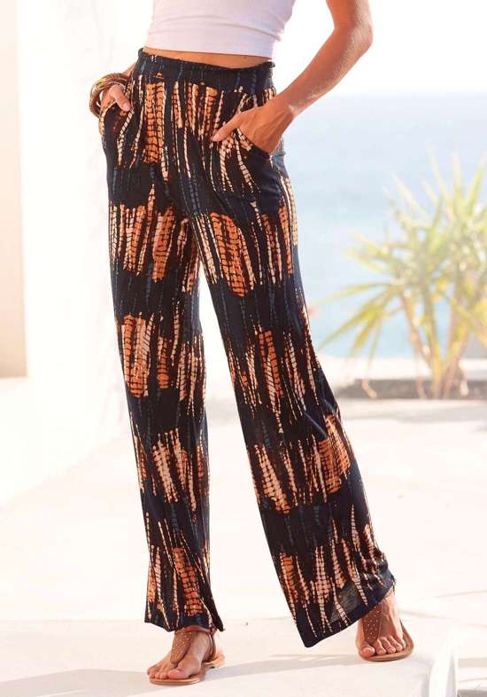 Брюки из джерси с принтом по всей поверхности и эластичным поясом.