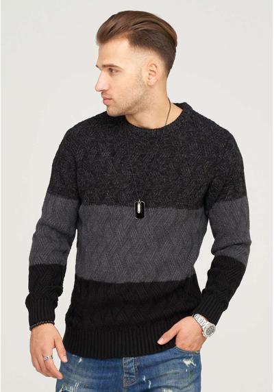 Вязаный свитер в стиле колор-блок.