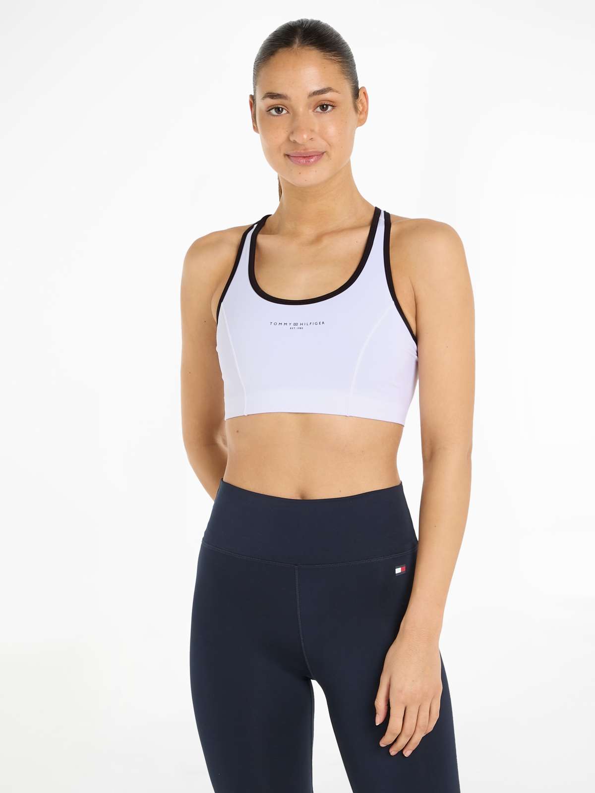 Спортивное бюстье с бретелями средней поддержки.»ESSENTIALS MINI CORP MID INT BRA«