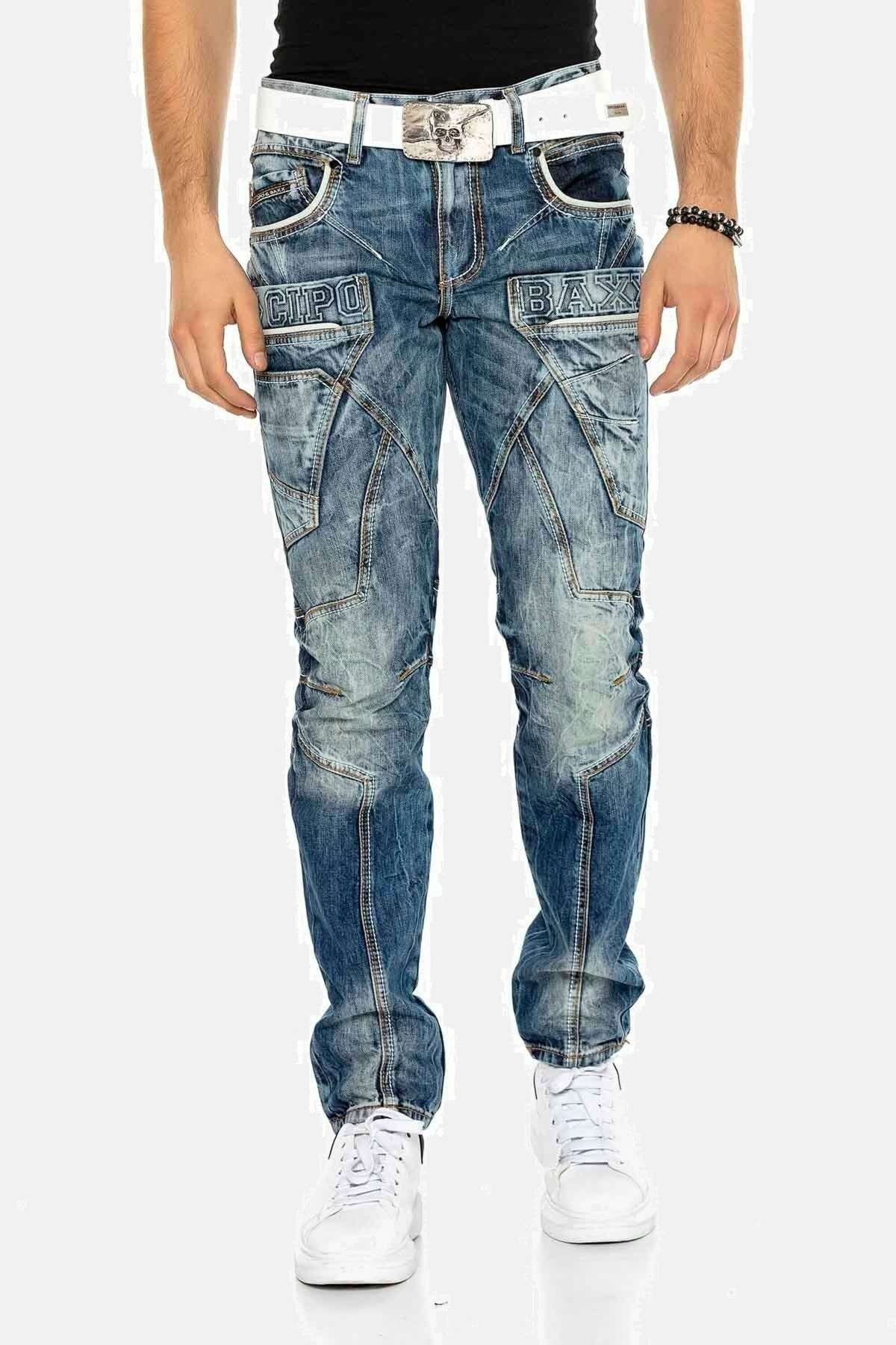 Джинсы зауженного кроя с контрастной строчкой и боковыми карманами. Jeans