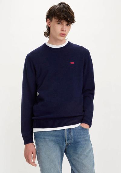 Шерстяной свитер классической круглой формы.