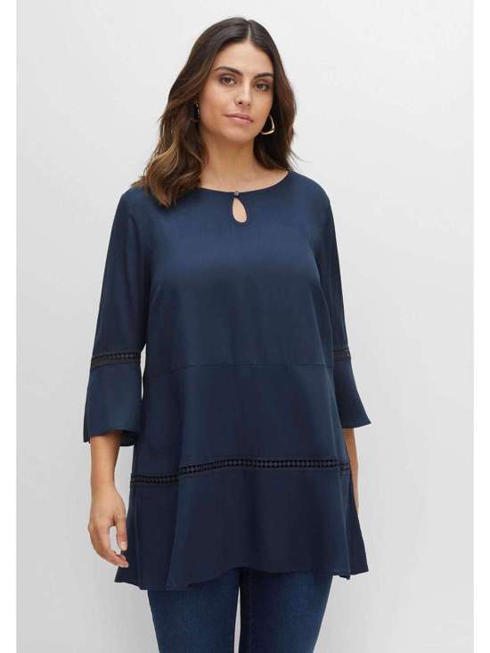 Длинная туника А-силуэта с узором из отверстий. Große Größen