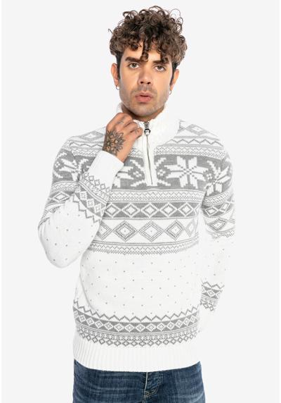Вязаный свитер с модным норвежским узором.