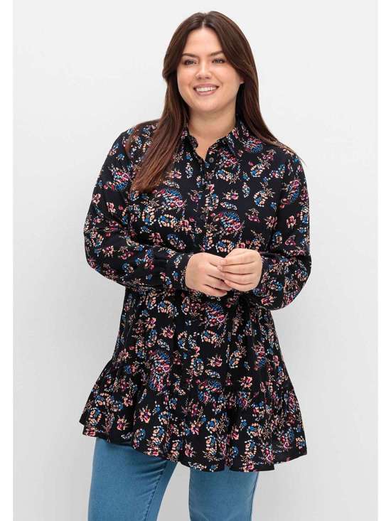 Блузка с длинными рукавами, цветочным принтом и оборкой по подолу. Große Größen
