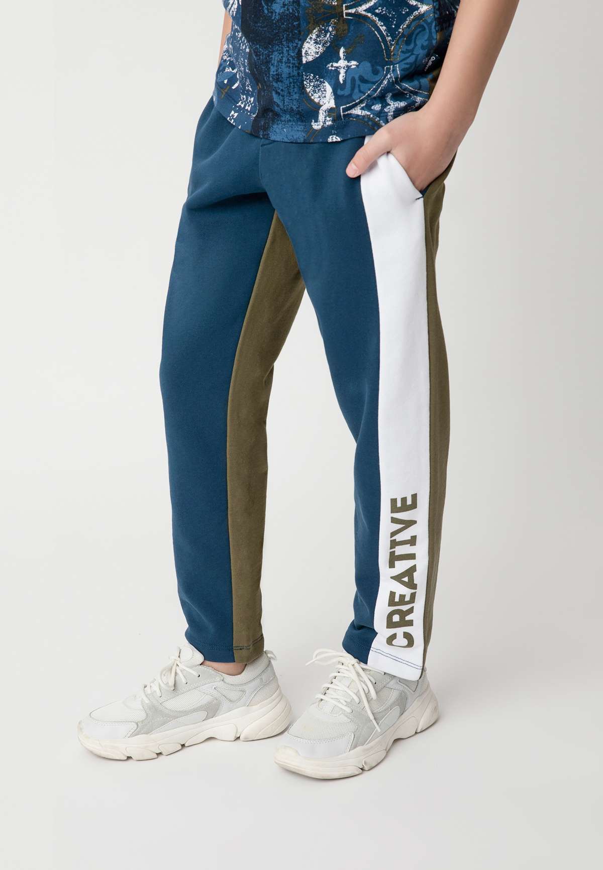 Спортивные брюки с регулируемым поясом Gulliver синий-зеленый (Европейские  размеры) цвет купить в магазине одежды JOYLY.RU с доставкой по России