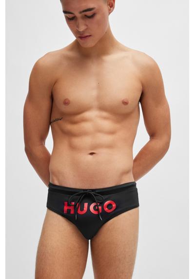 Плавки с крупным контрастным логотипом HUGO.