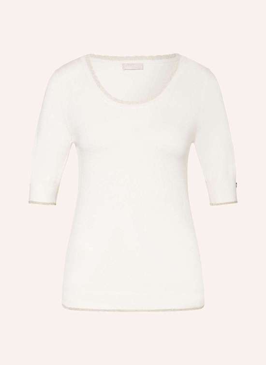 Вязаная рубашка из блестящей пряжи