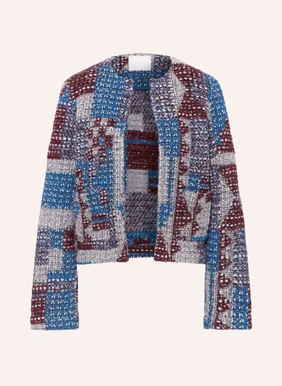 Вязаный чехол из блестящей пряжи.