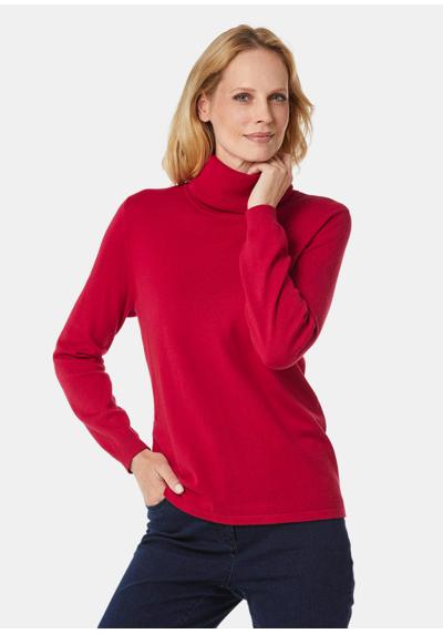 Модный свитер с высоким воротником