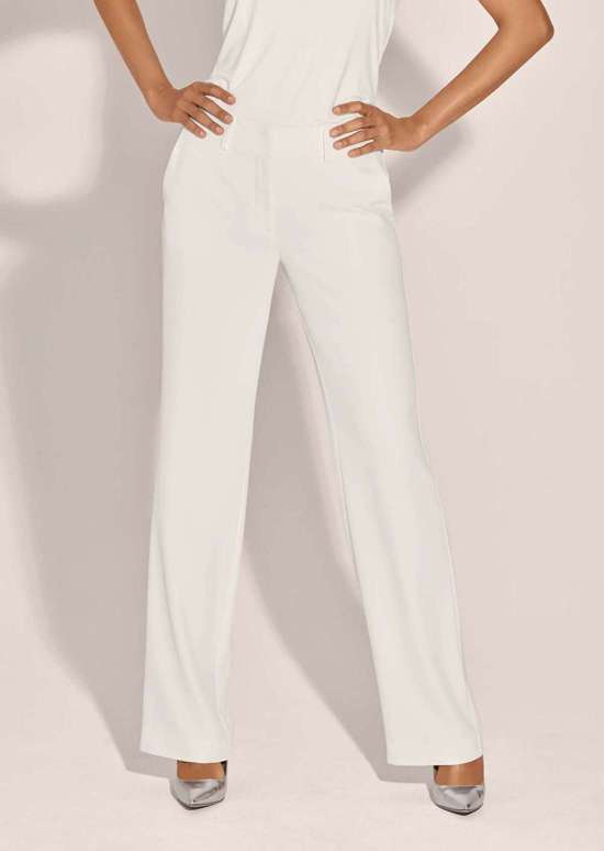 Широкие брюки стрейч с запрессованными складками.