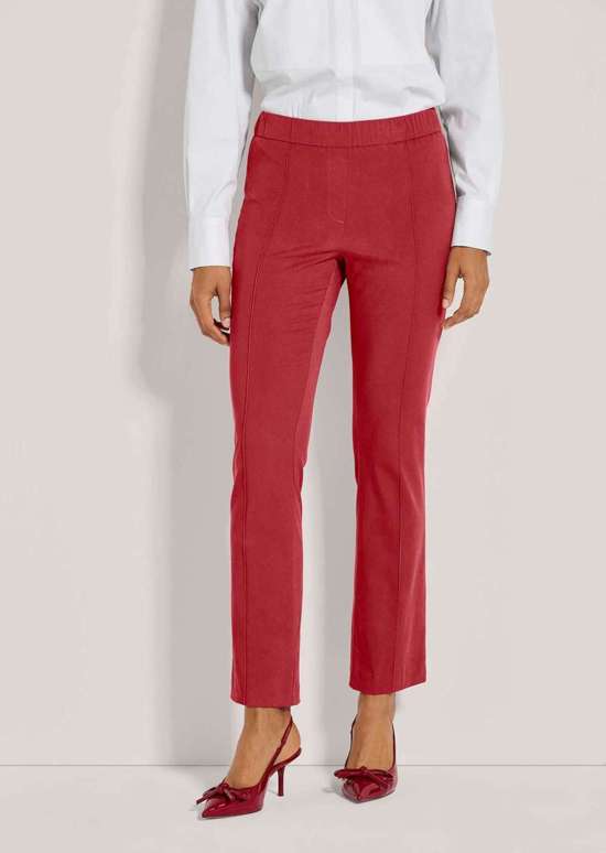 Джеггинсы с зажатыми складками