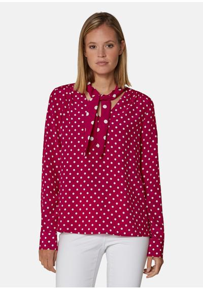 Блузка с завязками в модном узоре в горошек