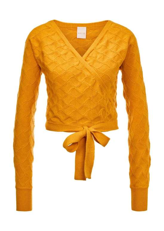 Кардиган женственной формы с запахом.