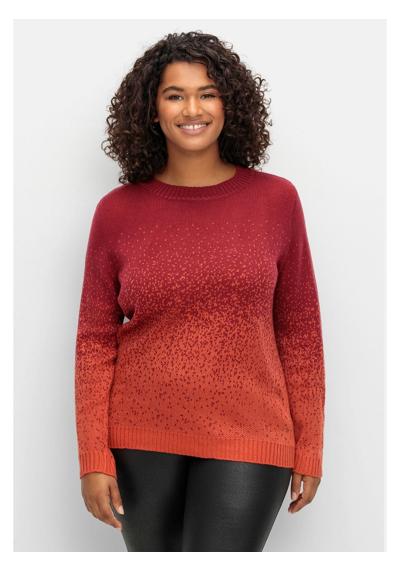 Вязаный свитер больших размеров жаккардовой вязкой.