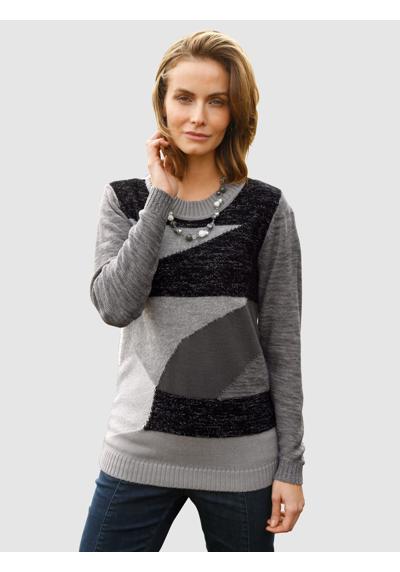Вязаный свитер-свитер в стиле пэчворк.