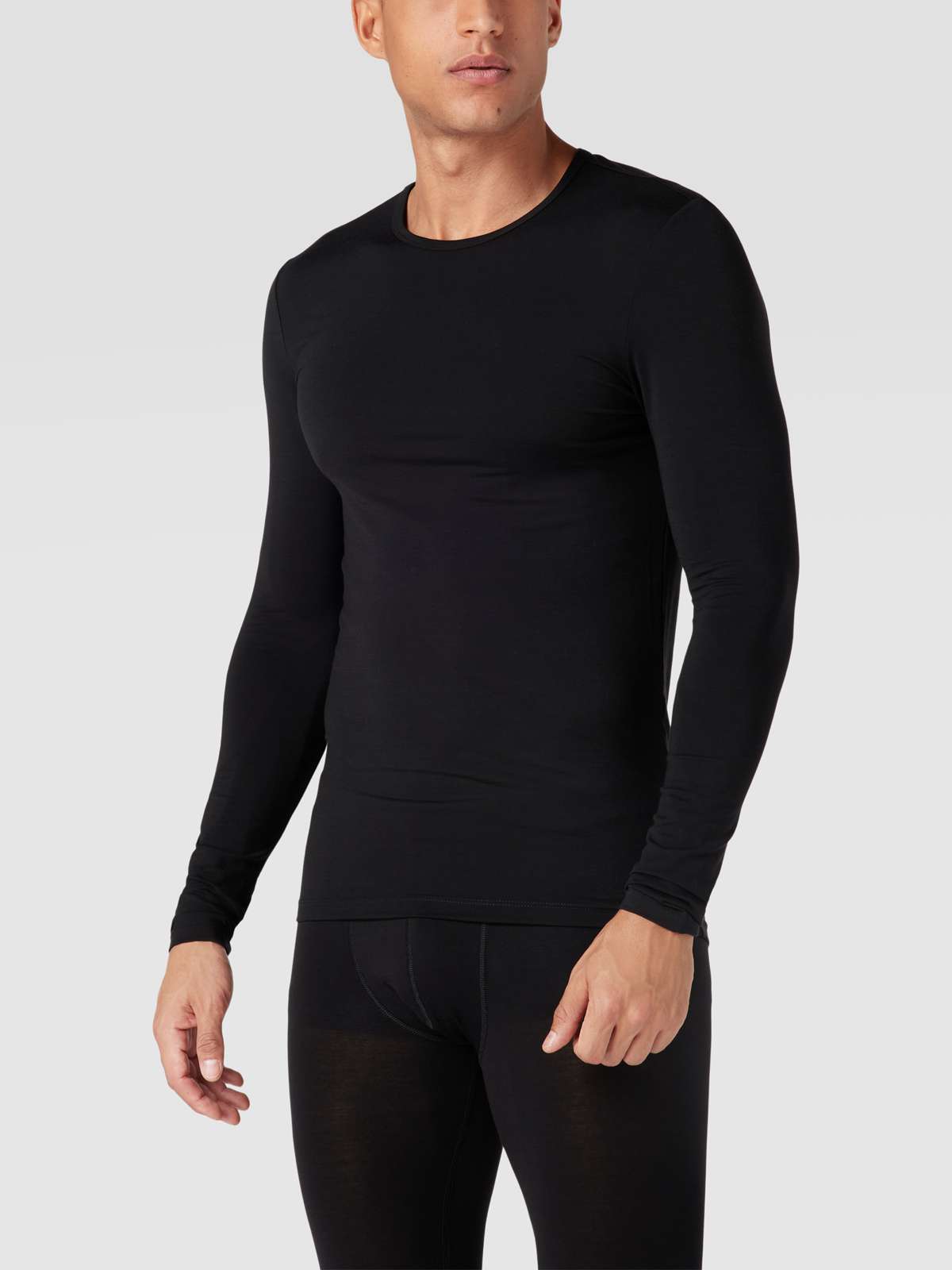 Лонгслив с этикеткой WARMING BASELAYER