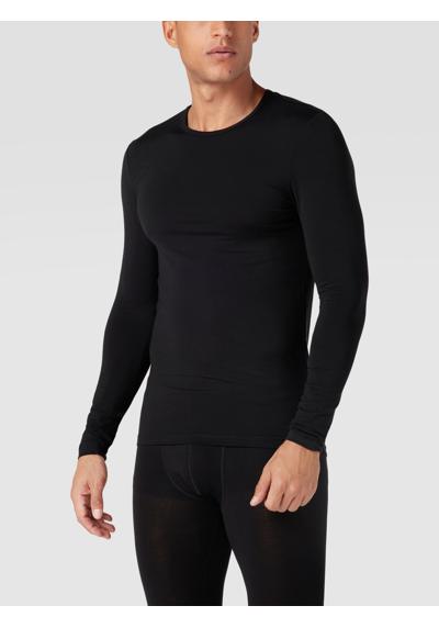 Лонгслив с этикеткой WARMING BASELAYER