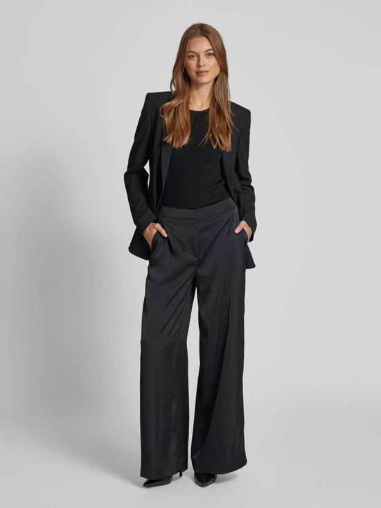 Тканевые брюки с французскими карманами