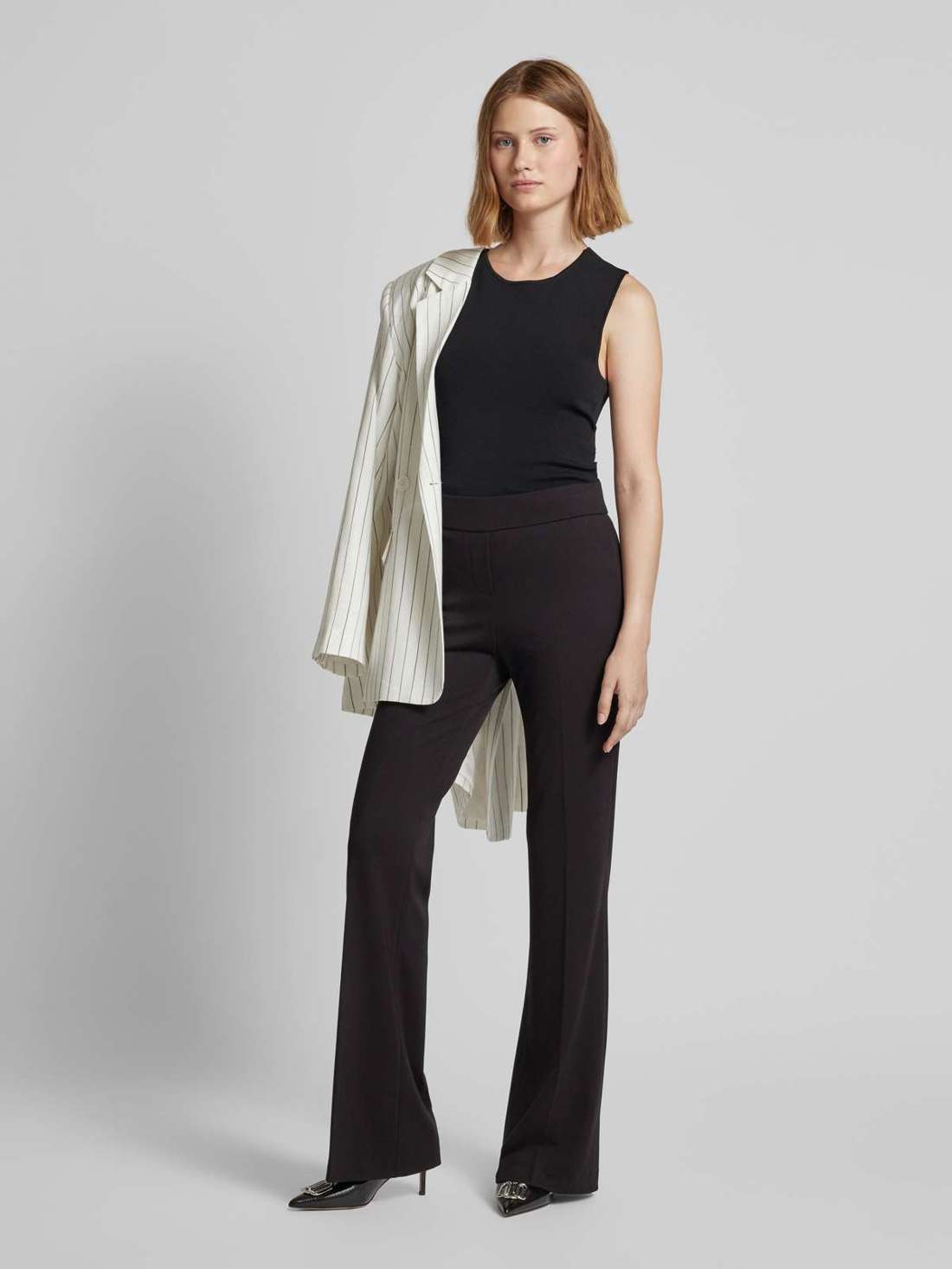 Расклешенные брюки из ткани с запрессованными складками NANOU