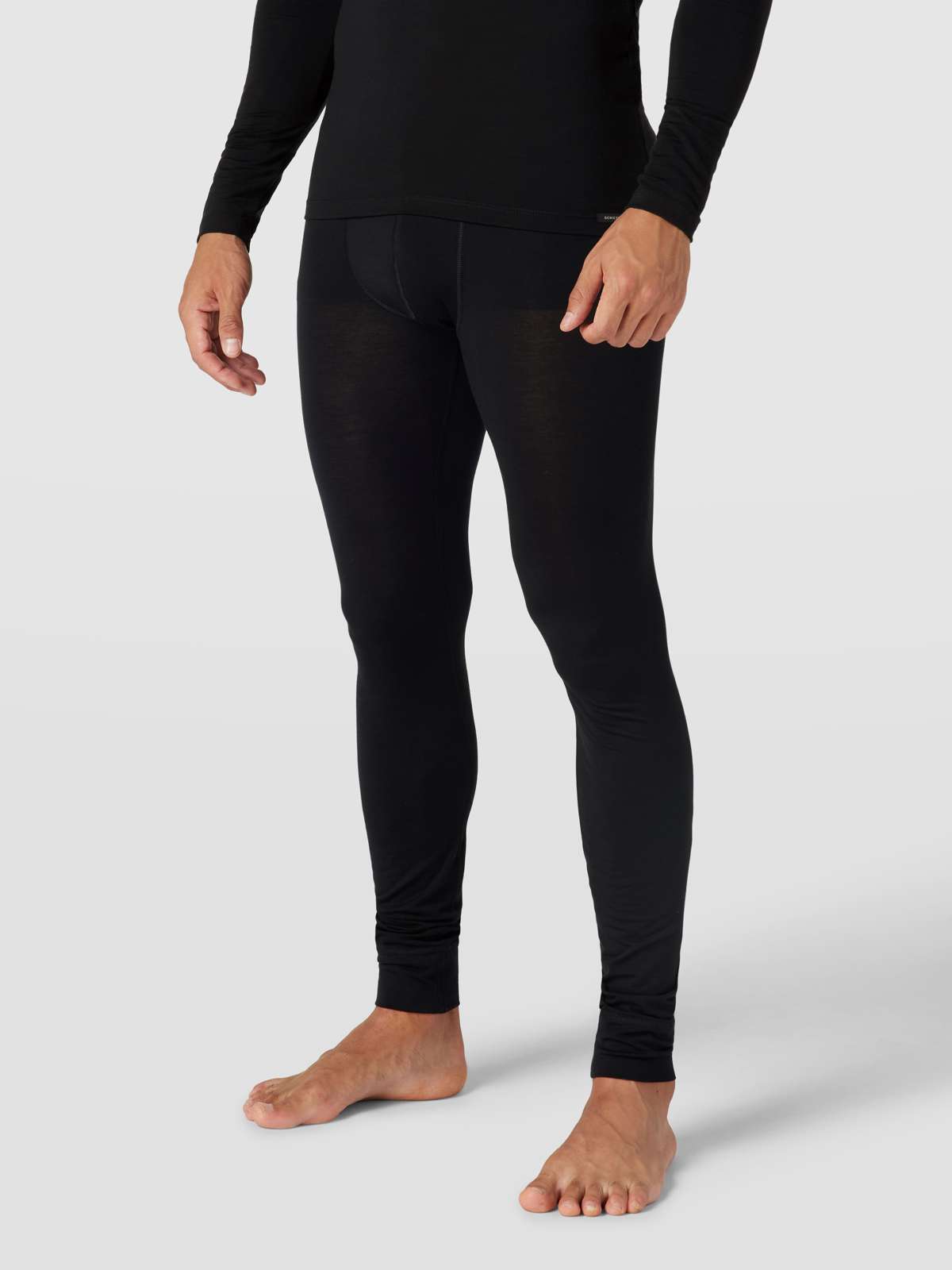 Лонг Джонс с этикеткой WARMING BASELAYER