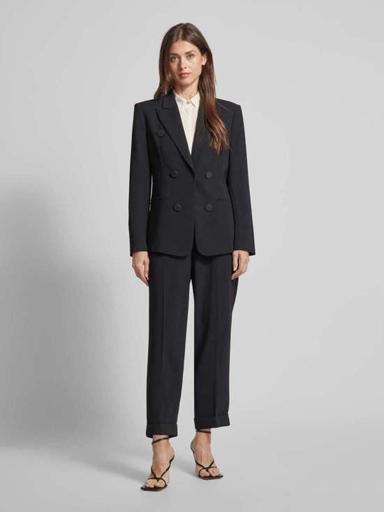 Брюки зауженного кроя со складками