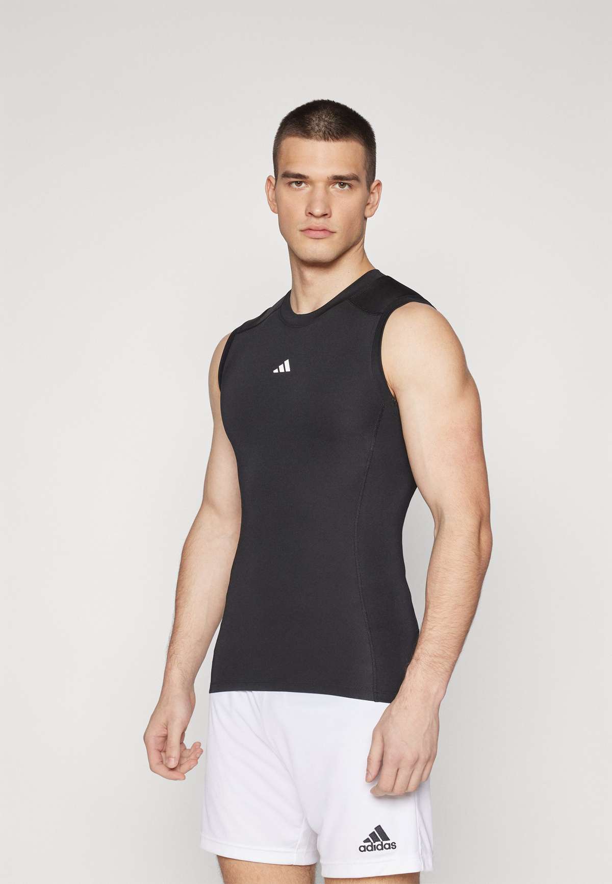 Топ TECHFIT COMPRESSION SLEEVELESS TANK